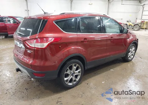 2016 Ford Escape Titanium z USA, uszkodzony, nr VIN 1FMCU9J94GUB12785